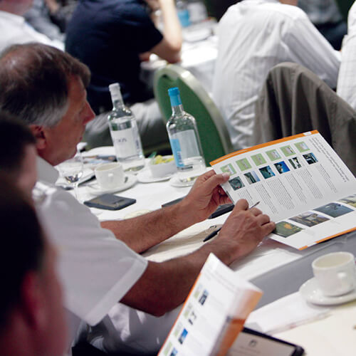 A delegate reading a brochure at a Tensar-led CPD seminar